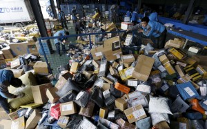 Employees work at a delivery service’s sorting centre ahead of the Singles’ Day online shopping festival in Beijing. Photo: Reuters