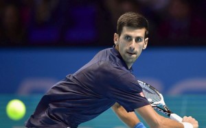 Novak Djokovic prepares to hit a return during his win over Milos Raonic at the ATP World Tour Finals. Photo: Kyodo