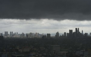 Dark storm clouds over the Manila skyline. Before Singapore, before Hong Kong, Manila was the undisputed centre of commerce in Asia Pacific. Photo: AFP