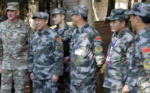 US Army Pacific commander General Robert Brown (left), and General Liu Xiaowu (second left), the PLA commander of the Chinese southern military region, watch soldiers conducting a rescue operation during the humanitarian relief military drill in Kunming on Friday. Photo: AP US Army Pacific commander General Robert Brown (left), and General Liu Xiaowu (second left), the PLA commander of the Chinese southern military region, watch soldiers conducting a rescue operation during the humanitarian relief military drill in Kunming on Friday. Photo: AP