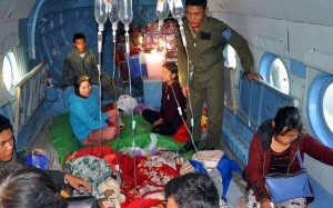 A Myanmar Military News showing soldiers helping wounded people on the military helicopter in Lashio, Shan State, northern Myanmar, on Sunday. Photo: EPA