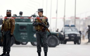 Afghan security officials inspect the scene of a suicide bomb attack that targeted a Shiite Muslims religious school in Kabul. Photo: EPA Afghan security officials inspect the scene of a suicide bomb attack that targeted a Shiite Muslims religious school in Kabul. Photo: EPA