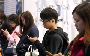 Consumers are charged very low prices for mobile services in Hong Kong but its spectral prices are among the highest in the world. Photo: Nora Tam