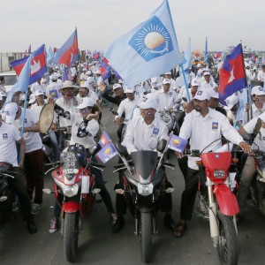 Cambodians campaign for the local council elections in Phnom Penh. Photo: EPA