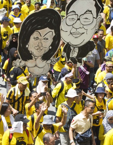 Activists from the Coalition for Clean and Fair Elections (Bersih), march during a rally in Kuala Lumpur. Photo: AP Activists from the Coalition for Clean and Fair Elections (Bersih), march during a rally in Kuala Lumpur. Photo: AP