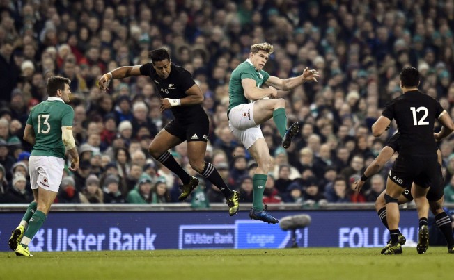 Ireland’s Andrew Trimble and New Zealand’s Julian Savea take to the air as the All Blacks exact revenge with a 21-9 win in Dublin on Sunday morning (Hong Kong time). Photo: Reuters