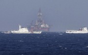 The Chinese oil rig HD 981 in disputed waters off Vietnam is surrounded by Chinese coastguard ships in May. Photo: Reuters The Chinese oil rig HD 981 in disputed waters off Vietnam is surrounded by Chinese coastguard ships in May. Photo: Reuters