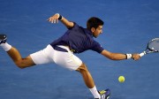 epa05131134 Novak Djokovic of Serbia in action against Roger Federer of Switzerland during their semi final match on day eleven of the Australian Open tennis tournament in Melbourne, Australia, 28 January 2016. EPA/JOE CASTRO AUSTRALIA AND NEW ZEALAND OUT