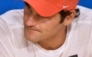 Switzerland's Roger Federer looks on during a press conference after defeat in his men's singles semi-final match against Serbia's Novak Djokovic on day eleven of the 2016 Australian Open tennis tournament in Melbourne on January 28, 2016. AFP PHOTO / PETER PARKS -- IMAGE RESTRICTED TO EDITORIAL USE - STRICTLY NO COMMERCIAL USE