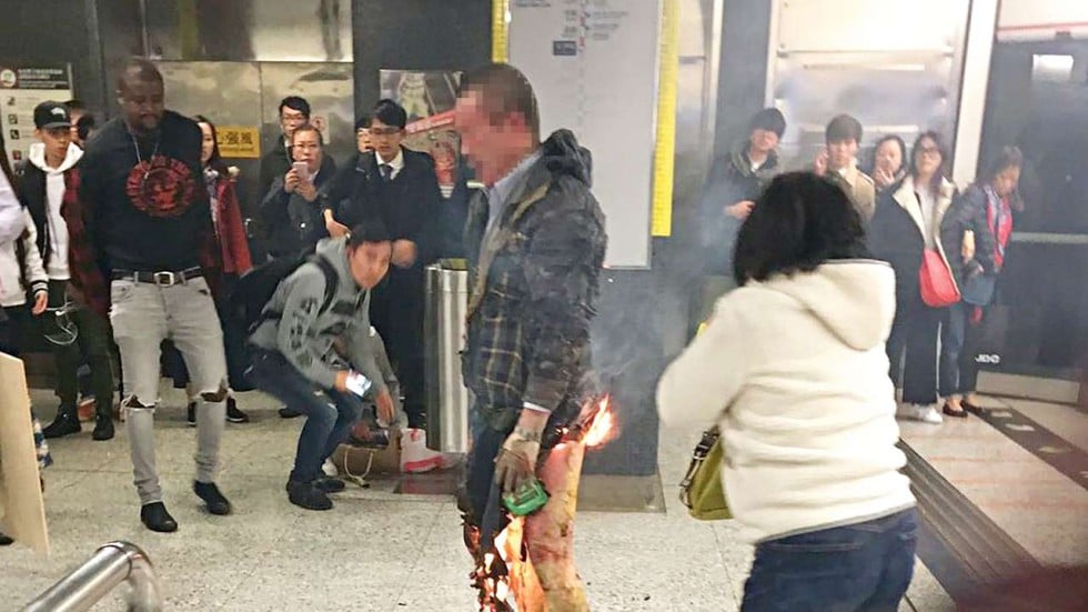 Image result for Man arrested after firebomb attack on Hong Kong MTR train injures at least 18