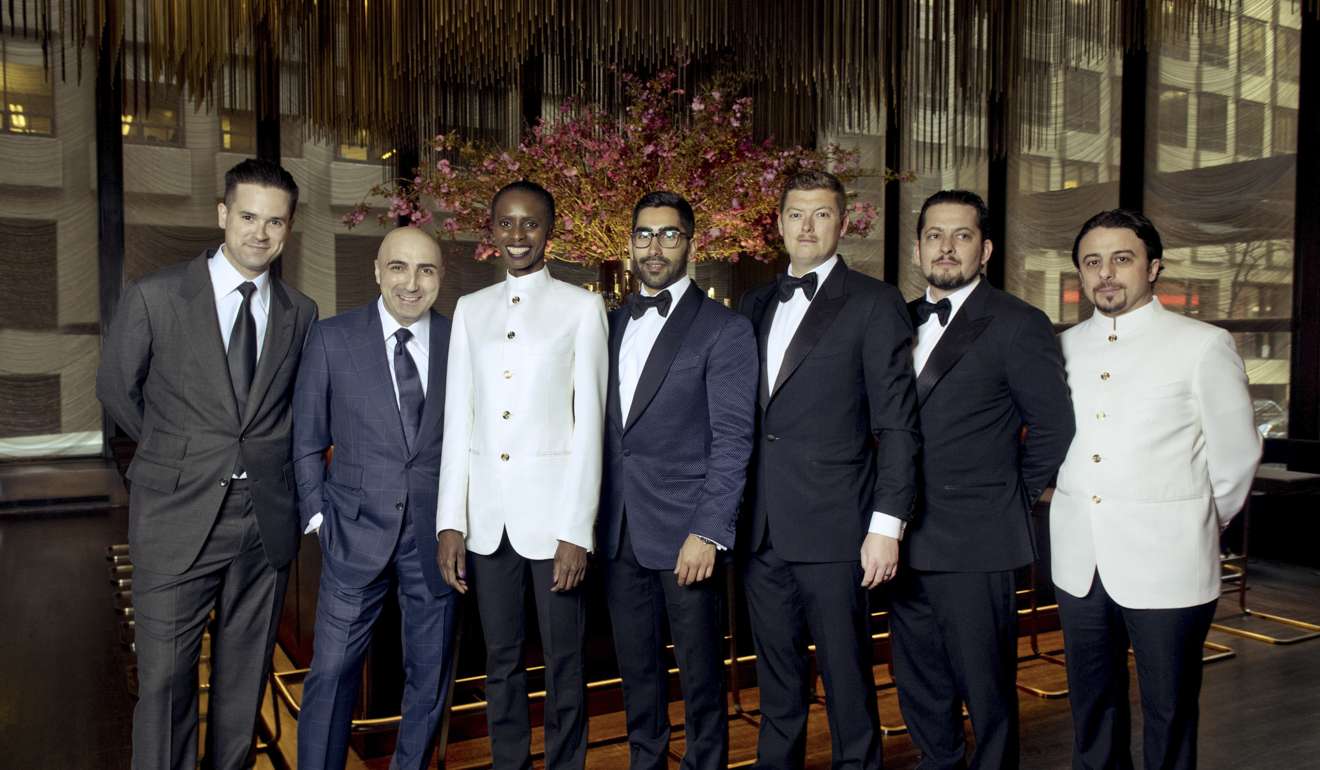Staff members of the Grill wearing clothing designed by Tom Ford at the restaurant in New York. Photo: Bloomberg