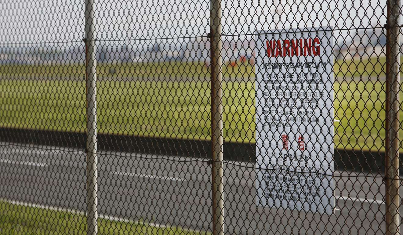 A security fence surrounding the US Air Force's Yokota Air Base in Fussa. Photo: AP