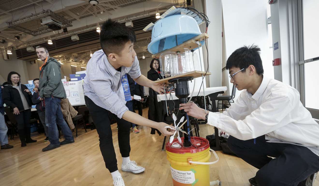Students showcase their all-weather electricity generator prototype during the 35th Greater Vancouver Regional Science Fair held in Vancouver, Canada. Photo: Xinhua