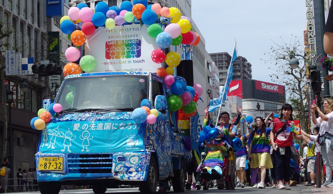 The Tokyo Rainbow Pride Parade passes through Shibuya, Tokyo.