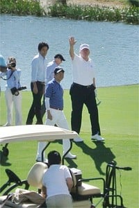 US President Donald Trump and Japan’s Prime Minister Shinzo Abe, second from right, playing golf in Florida. Photo: AFP
