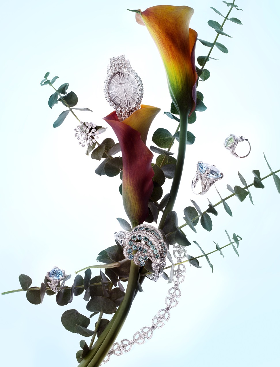 Chopard, watch; Nirav Modi, flowery ring; Tiffany & Co, bracelet tourmaline cuff; Dior Joiallerie, Blue Paraiba tourmaline ring, aquamarine ring, and yellow-green tourmaline ring; Harry Winston, bracelet