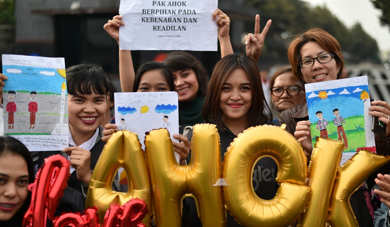 People attend a rally in Jakarta to show support for Basuki Tjahaja Purnama. Photo: AFP