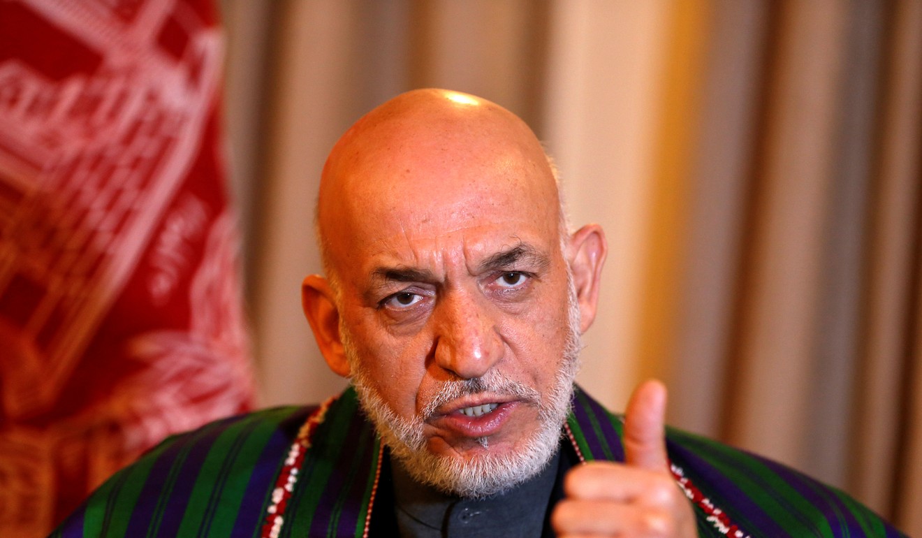 Under the administration of former Afghan president Hamid Karzai, shown in file photo from December 2014, China Metallurgical Group agreed to pay Afghanistan $3 billion to lease a large copper mining site for 30 years. Photo: Reuters