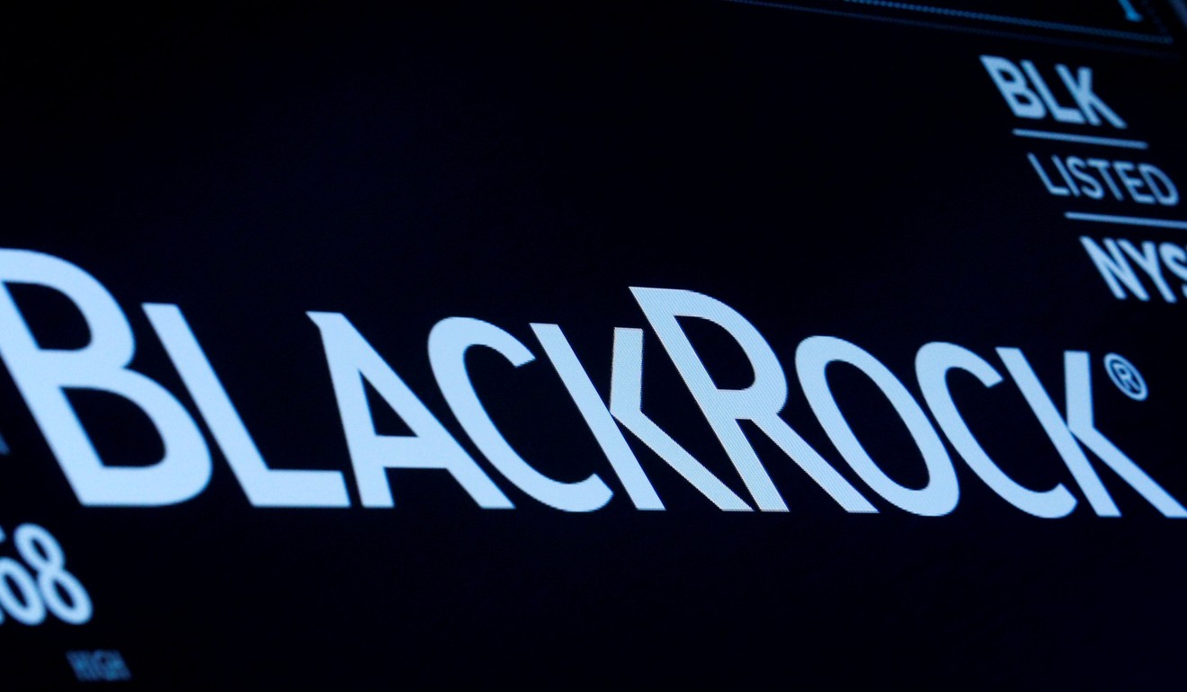 The company logo and trading information for BlackRock as the asset manager supported proposals in Occidental Petroleum to report on business impact of climate change. Photo: Reuters