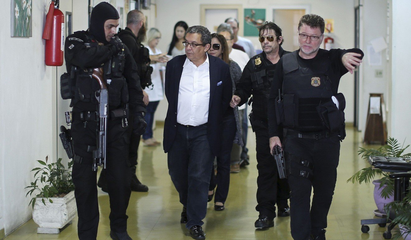 Joao Santana is arrested upon his arrival in Sao Paulo. Photo: AFP