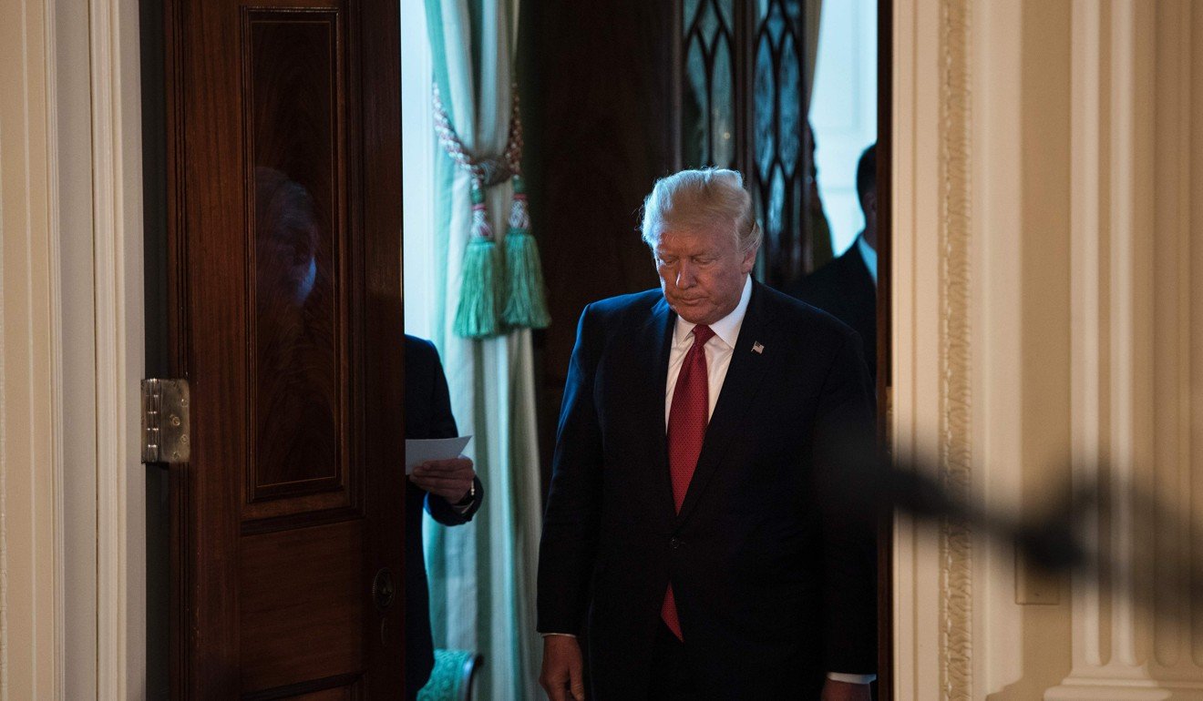 US President Donald Trump arrives for a press conference with Colombia's President President Juan Manuel Santos in the East Room of the White House on Thursday. Photo: AFP