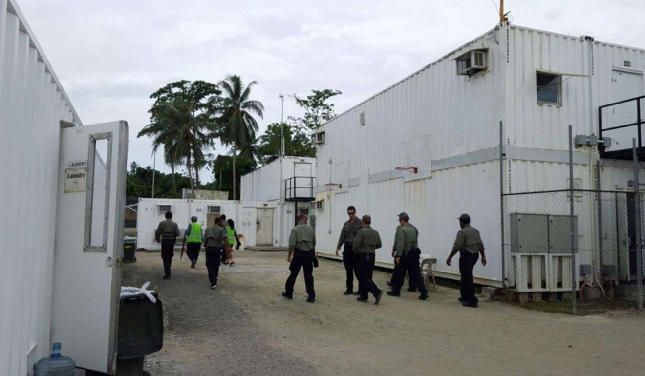 Officials inside the Manus Island refugee camp in Papua New Guinea. Photo: Reuters