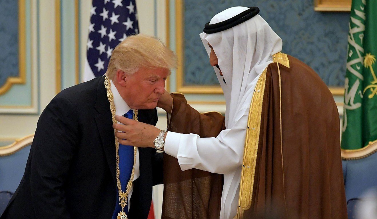 US President Donald Trump receives the Order of Abdulaziz al-Saud medal. Photo: AFP