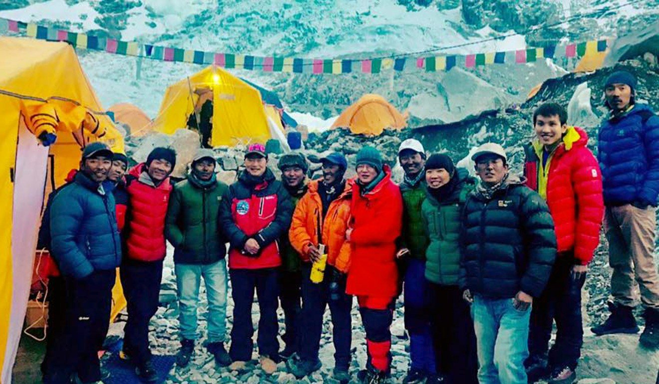 (Fourth from right) Ada Tsang with guides and team members at a base camp. Photo: Facebook