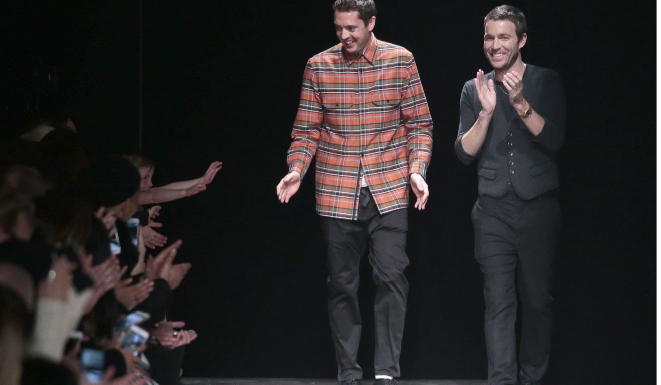 Fashion designers Marcus Wainwright (left) and David Neville. Photo: AFP