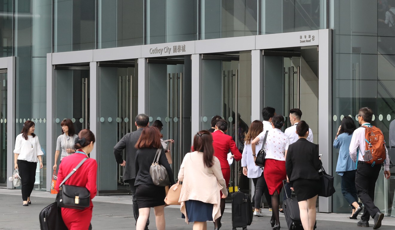 Lower-level Cathay Pacific staff will be next in line for cuts. Photo: Edward Wong