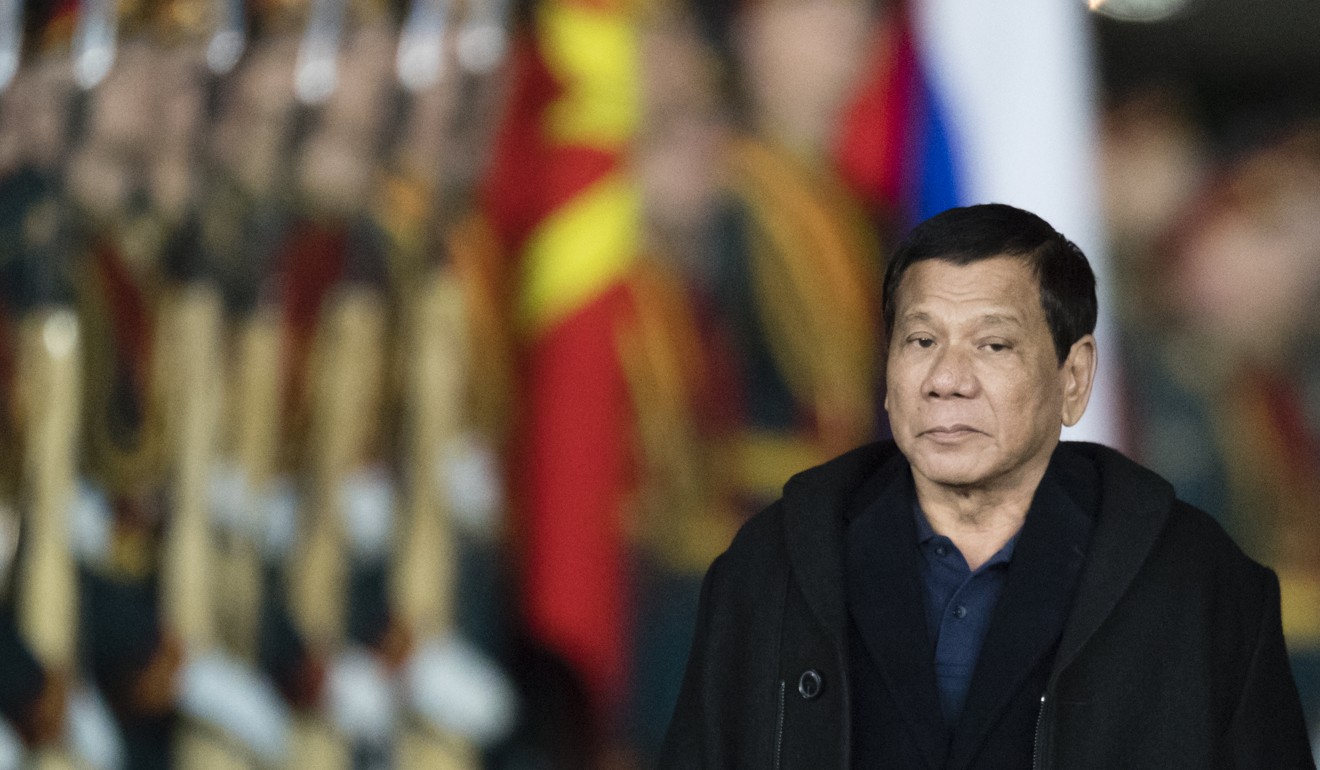 Philippine President Rodrigo Duterte reviews an honour guards upon his arrival at a government airport in Moscow on May 22. Photo: AP