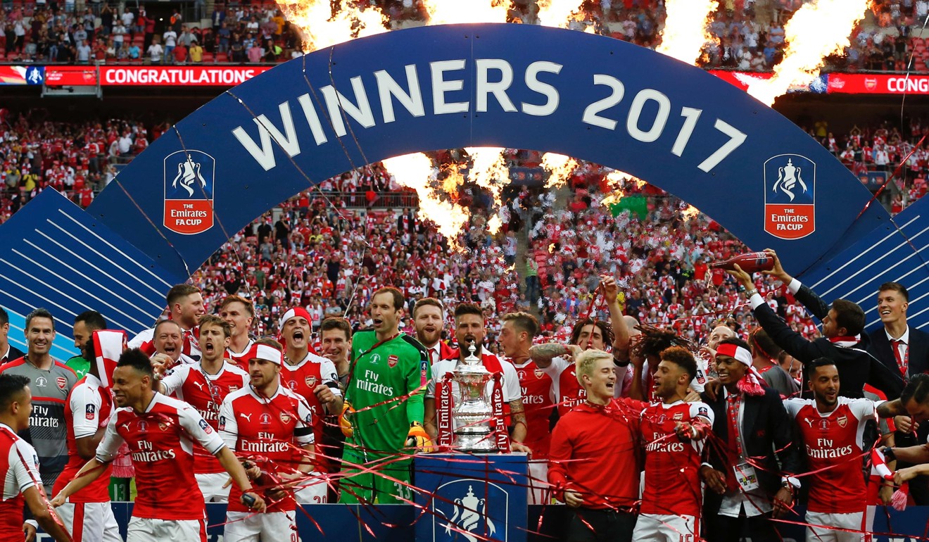 Arsenal's players celebrate their win over Chelsea in the FA Cup final. Photo: AFP