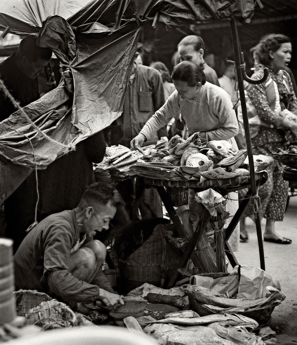 You Buy, I Sell, , a photo from Fan Ho’s series portraying Hong Kong in the 1950s and 1960s. Photo: Fan Ho