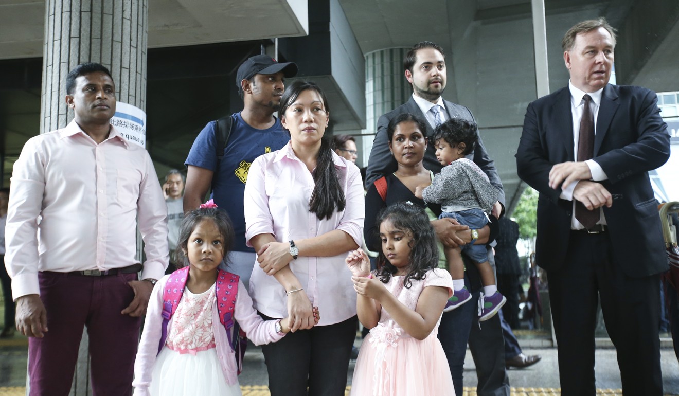 Refugees at Immigration Tower in Wan Chai. The asylum seekers who sheltered Edward Snowden when Snowden was hiding in Hong Kong are facing possible deportation to their home countries after immigration authorities rejected their case. Photo: David Wong