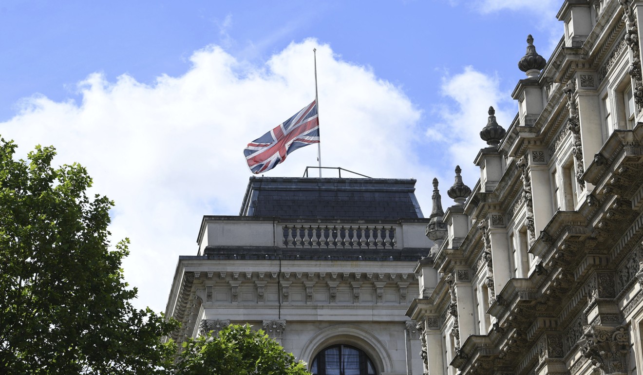 The Union Jack flying at half mast in Whitehall. Photo: AP