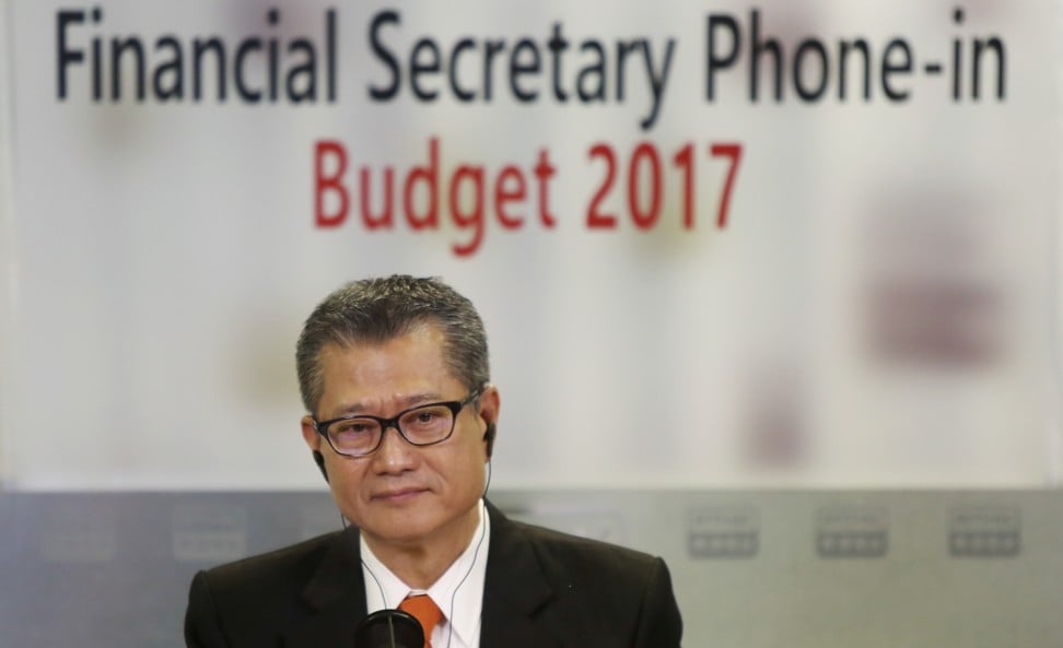 Financial Secretary Paul Chan Mo-po during a radio phone-in programme after his presentation of Hong Kong’s 2017 fiscal budget at RTHK in Kowloon Tong. Photo: Xiaomei Chen