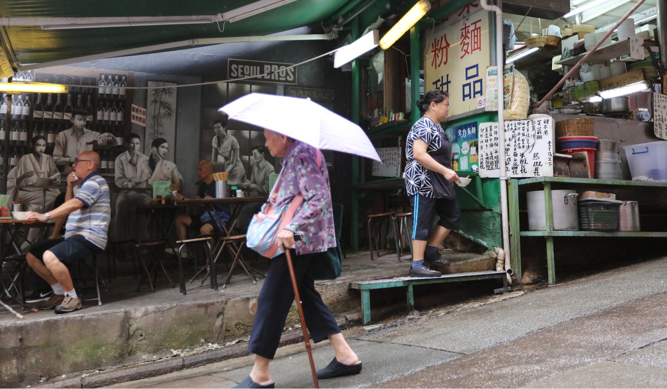After years spent trying to eradicate street markets and dai pai dong, the government is promoting walking tours of the city’s historic heart in Central. Photo: Felix Wong