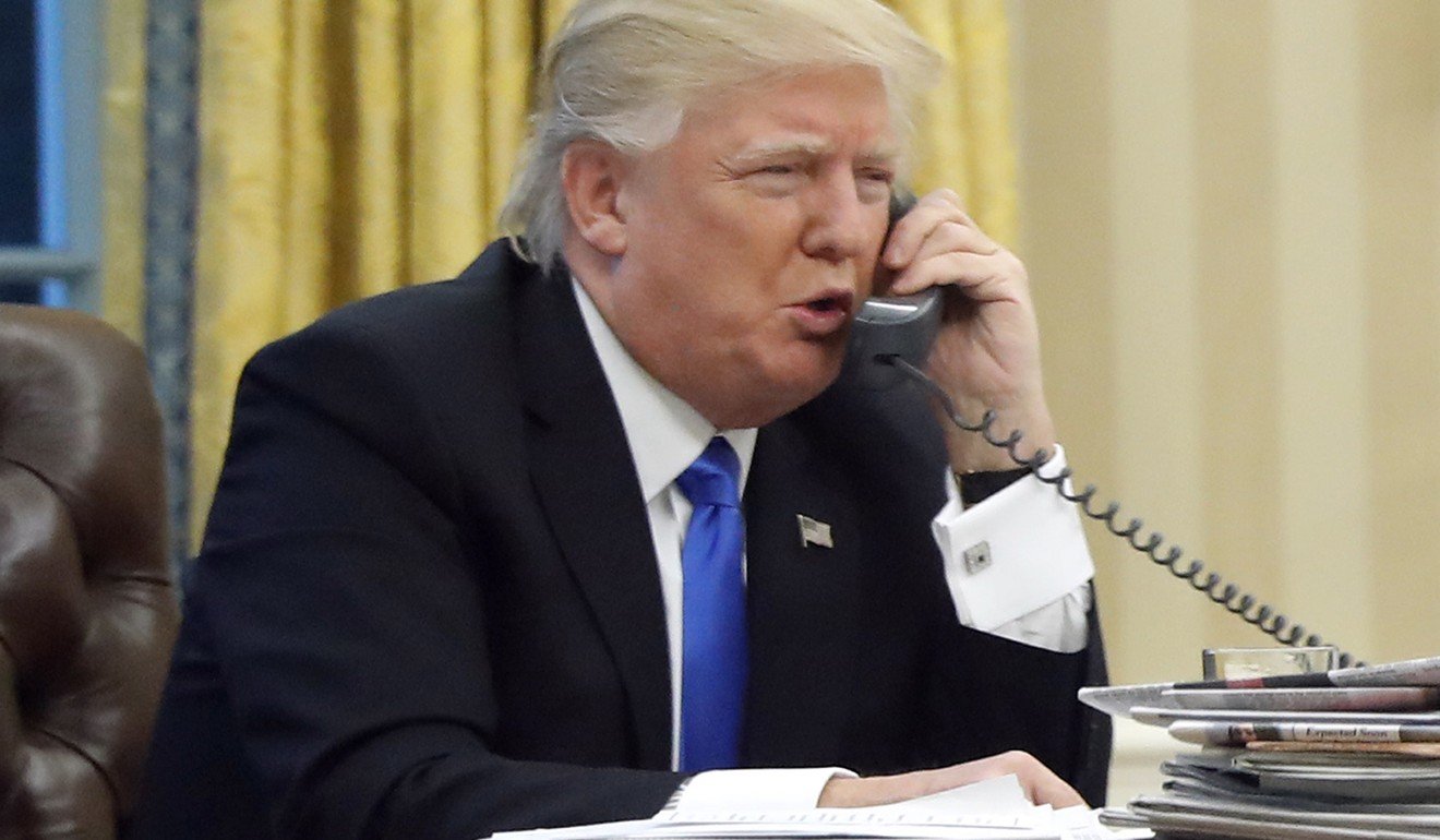 Donald Trump on the phone. Photo: AP