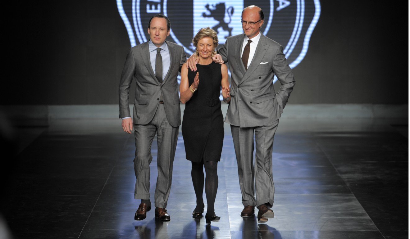 (L-R) Gildo Zenga, Anna Zenga and Paolo Zenga on the runway after Ermenegildo Zegna's fall 2010 menswear show at Via Savona