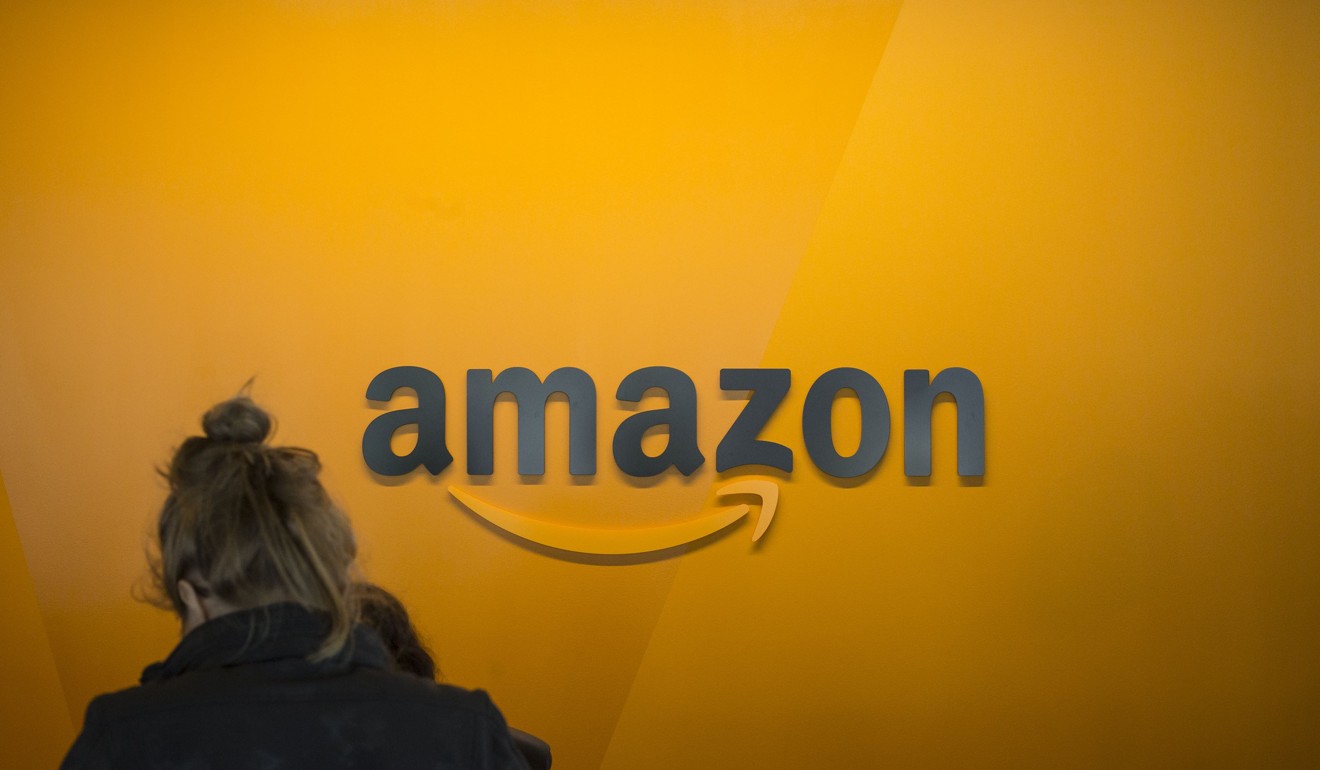 A visitor checks in at the Amazon corporate headquarters on June 16, 2017 in Seattle, Washington. Photo: AFP