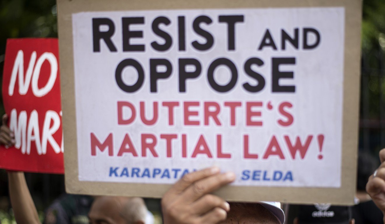 Filipino activists protest at the House of Representatives in Manila. Photo: AFP