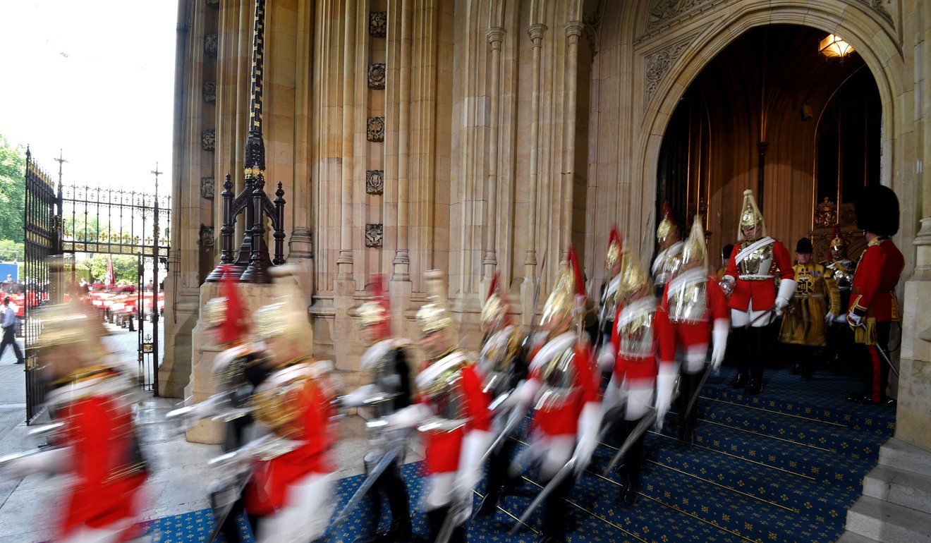 Members of the Household Cavalry leave the Houses of Parliament in London. Photo: AFP