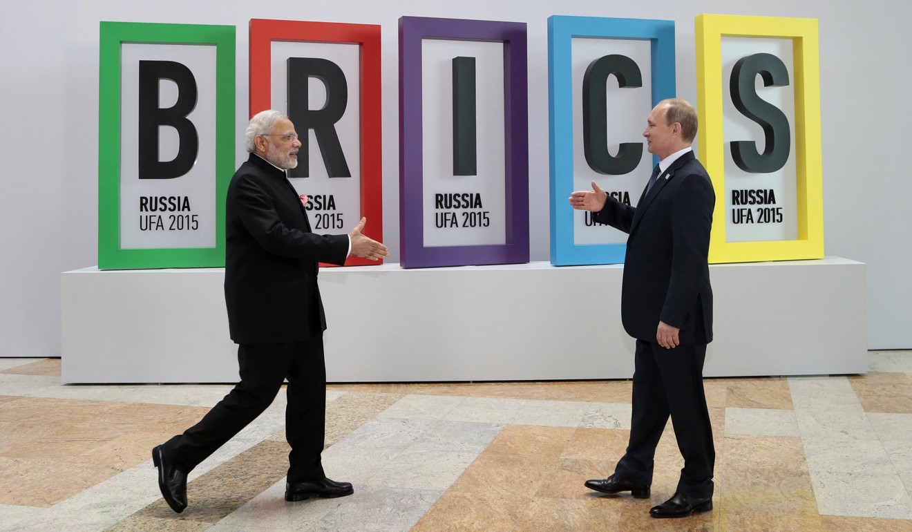 It’s July 2015, and Indian Prime Minister Narendra Modi, left, and Russian President Vladimir Putin prepare to shake hands prior to their talks during the BRICS Summit in Ufa, Russia. But with their own economies flagging at the time, some analysts were already questioning whether the group still had clout in representing nearly half the world's population and a quarter of its economy at $16.6 trillion. Photo: AP