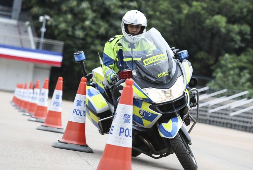 A member of the Force Escort Group goes through his paces at the Police College in Wong Chuk Hang. Photo: Nora Tam