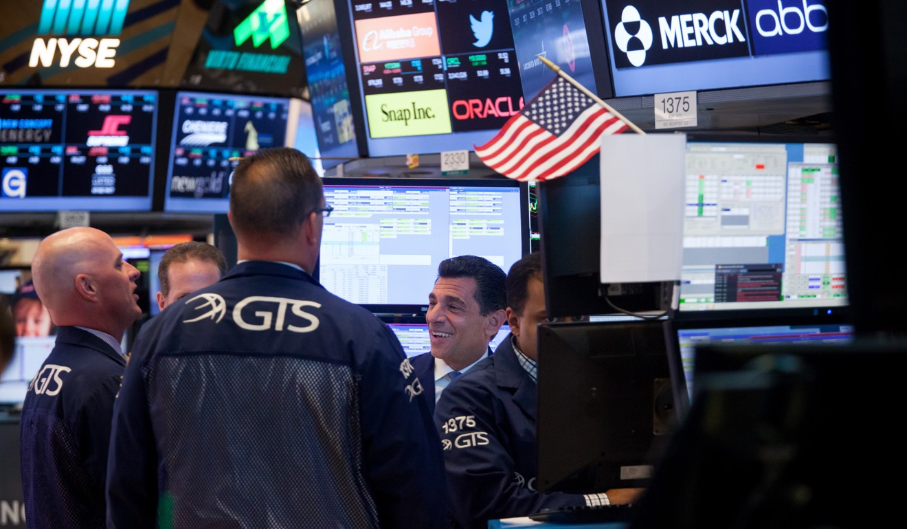 Traders on the floor of the New York Stock Exchange. A tech sell-off overnight in the US was triggered by the European Union hitting Google with a record US$2.7 billion antitrust fine. Photo: Bloomberg