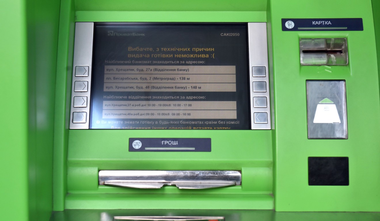 An ATM in Ukraine. A message on the screen reads: ‘Sorry for technical reasons, cash is not possible’. Photo: AFP