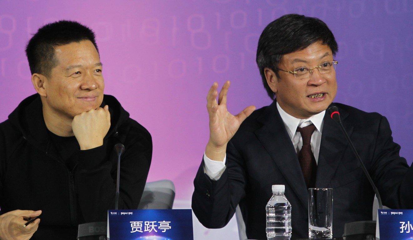 Happier times: LeEco’s Jia Yueting and the company’s strategic investor, Sun Hongbin, chairman of Sunac China Holdings, announcing their cooperation in Beijing in January. Photo: Simon Song