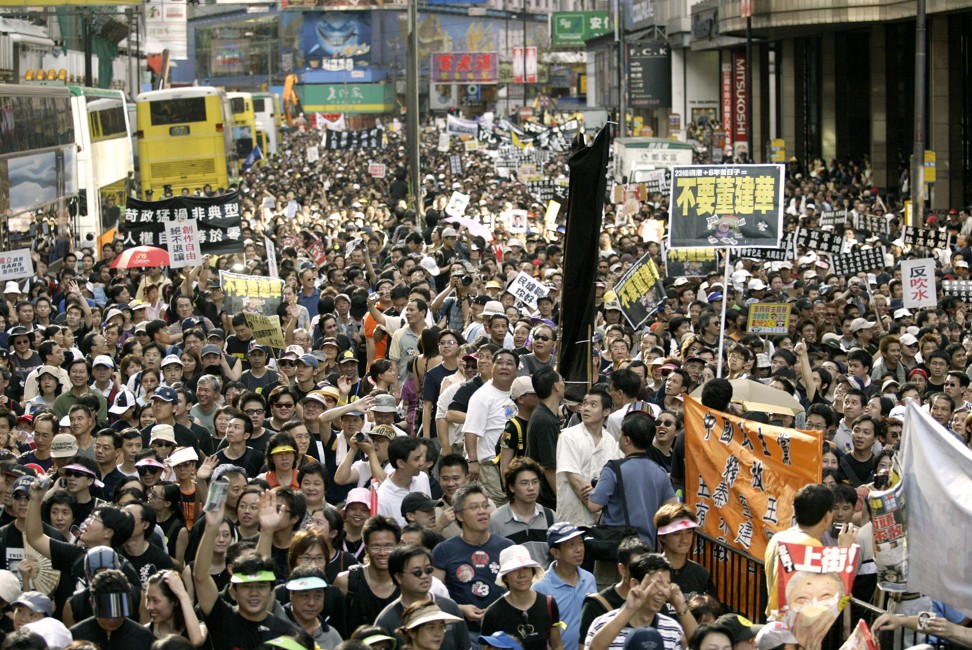 An estimated 500,000 people took to the streets on July 1, 2003 in a protest march in Causeway Bay, expressing opposition against a government proposal to introduce an unpopular piece of legislation. Photo: SCMP Pictures