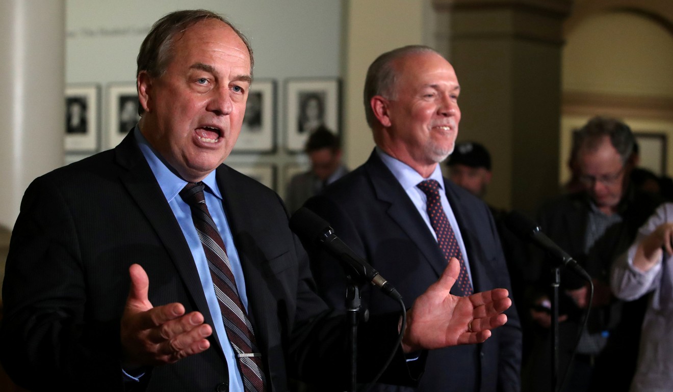 BC Green leader Andrew Weaver and New Democrat leader John Horgan have forged an alliance that will see Horgan installed as premier. Photo: Reuters