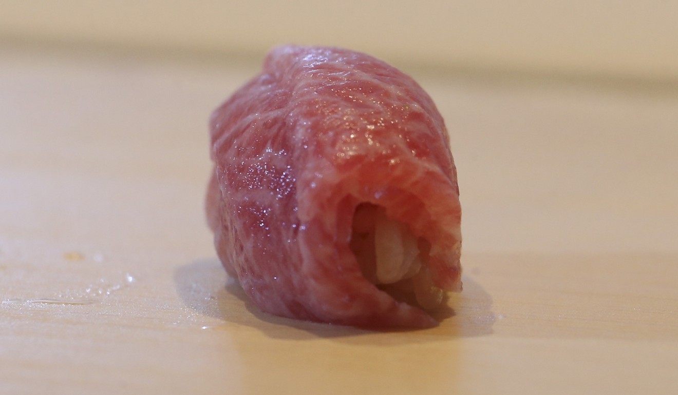 The three layers of tuna nigiri. Photo: David Wong